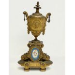 A late 19th century brass garniture urn. 16x31cm.