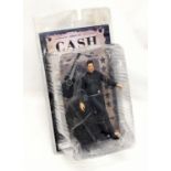 An unopened Johnny Cash (1932-2003) Walk The Line, Man In Black Action Figure Toy by Sota Toys.