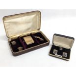 A pair of gold plated Masonic cufflinks with tiepin, with another Masonic set of cufflinks, tie clip