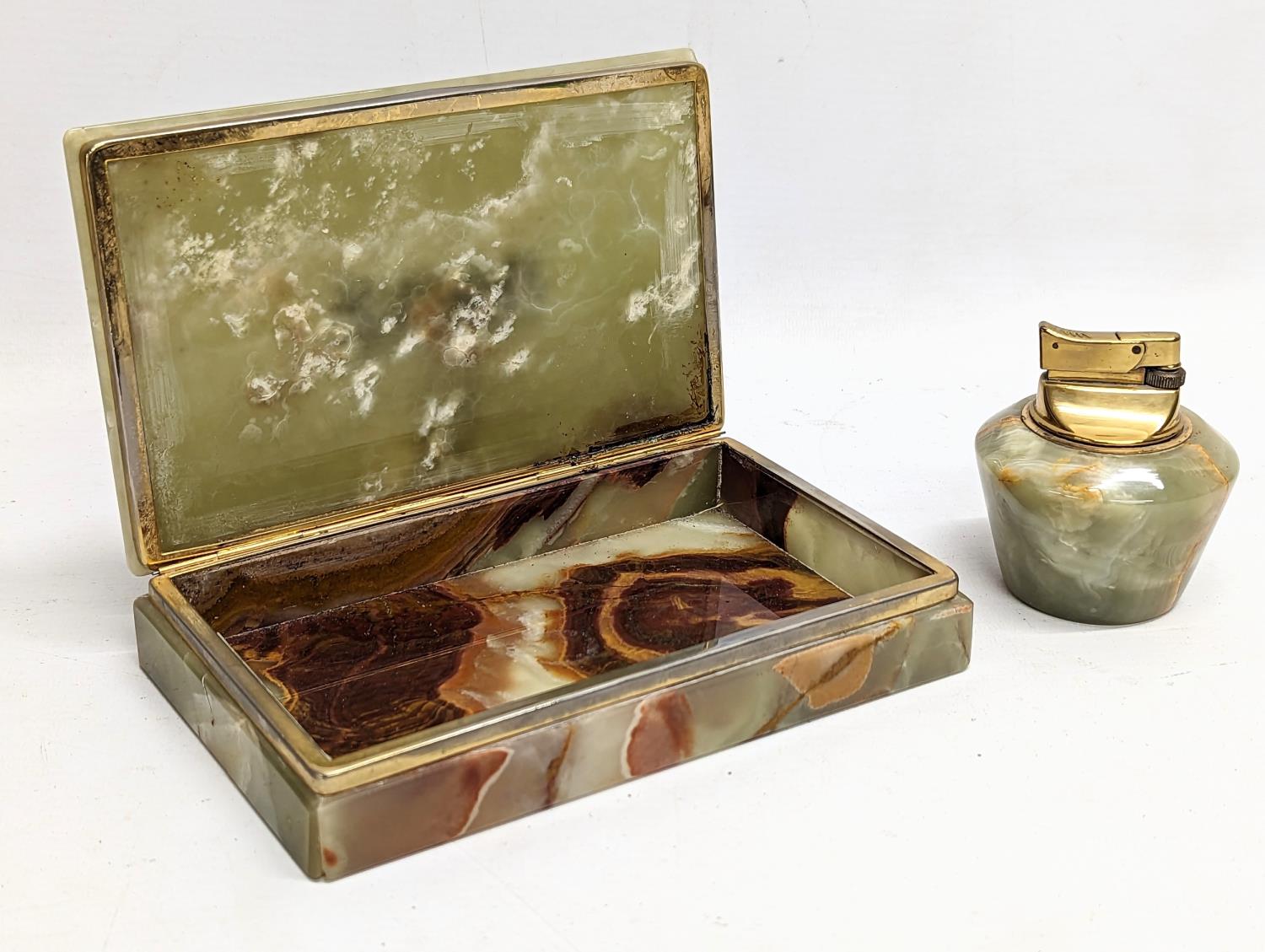 A vintage onyx cigar box with onyx lighter. Box measures 19x12cm