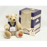 A Hamleys Heritage Bears Collection bear in box. William. Box measures 21x21x30cm