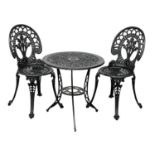 A cast alloy garden table and 2 chairs.