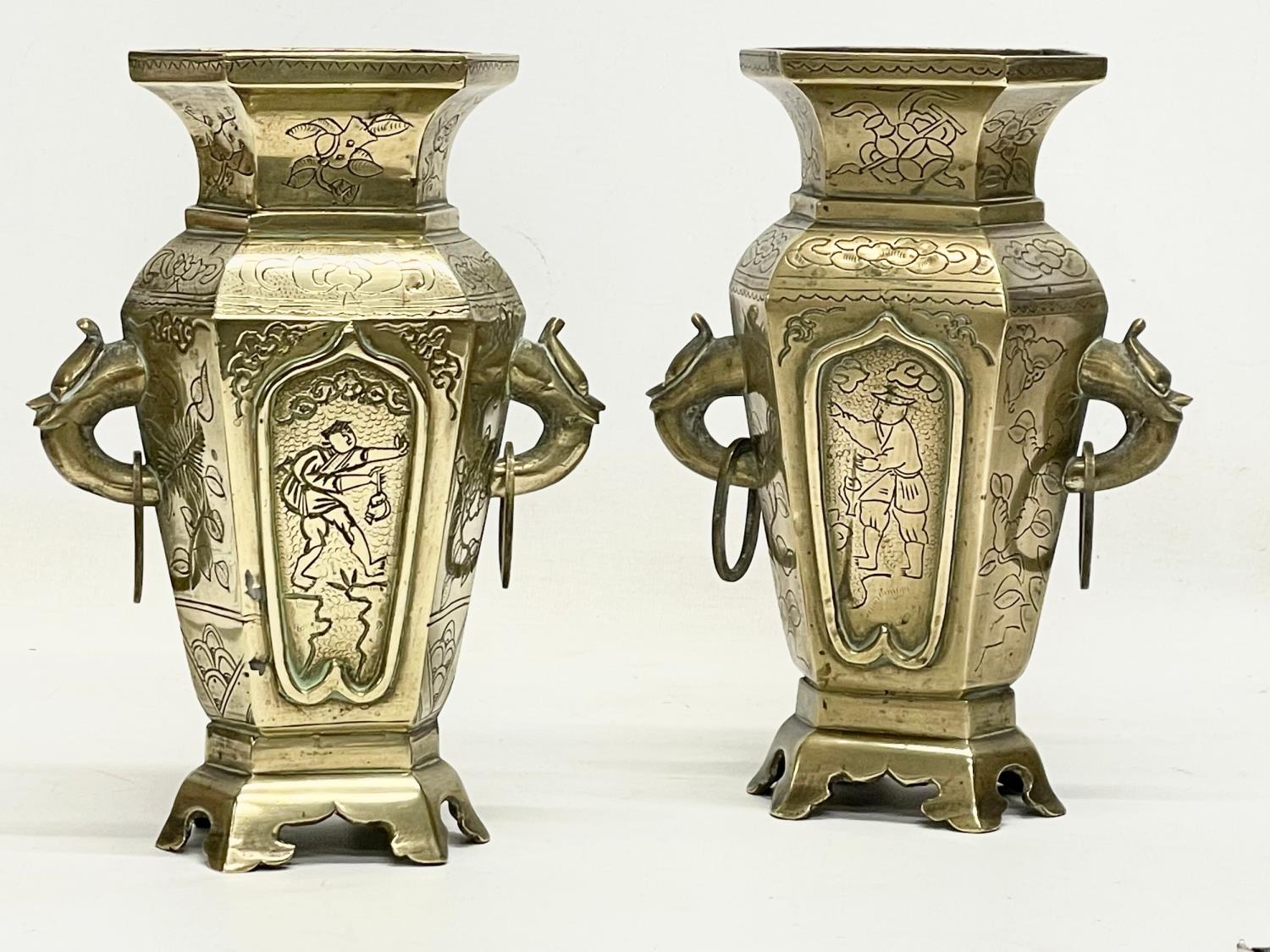 A pair of late 19th century Chinese brass vases. 15x21cm
