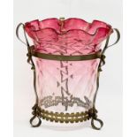 A large late Victorian Cranberry Glass shade in ornate brass frame. 25x26.5cm.