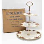 A Royal Albert Old Country Roses cake stand in original box. 26x36cm