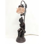 An ornate table lamp with glass shade. 56cm