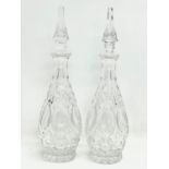 A pair of large vintage crystal decanters. 40cm