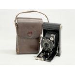 A vintage Kodak Vest Pocket Model B camera in case.