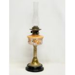 A Victorian double burner oil lamp. 64cm.