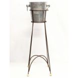 A vintage Laurent- Perrier Champagne ice bucket on stand. 79cm including bucket.