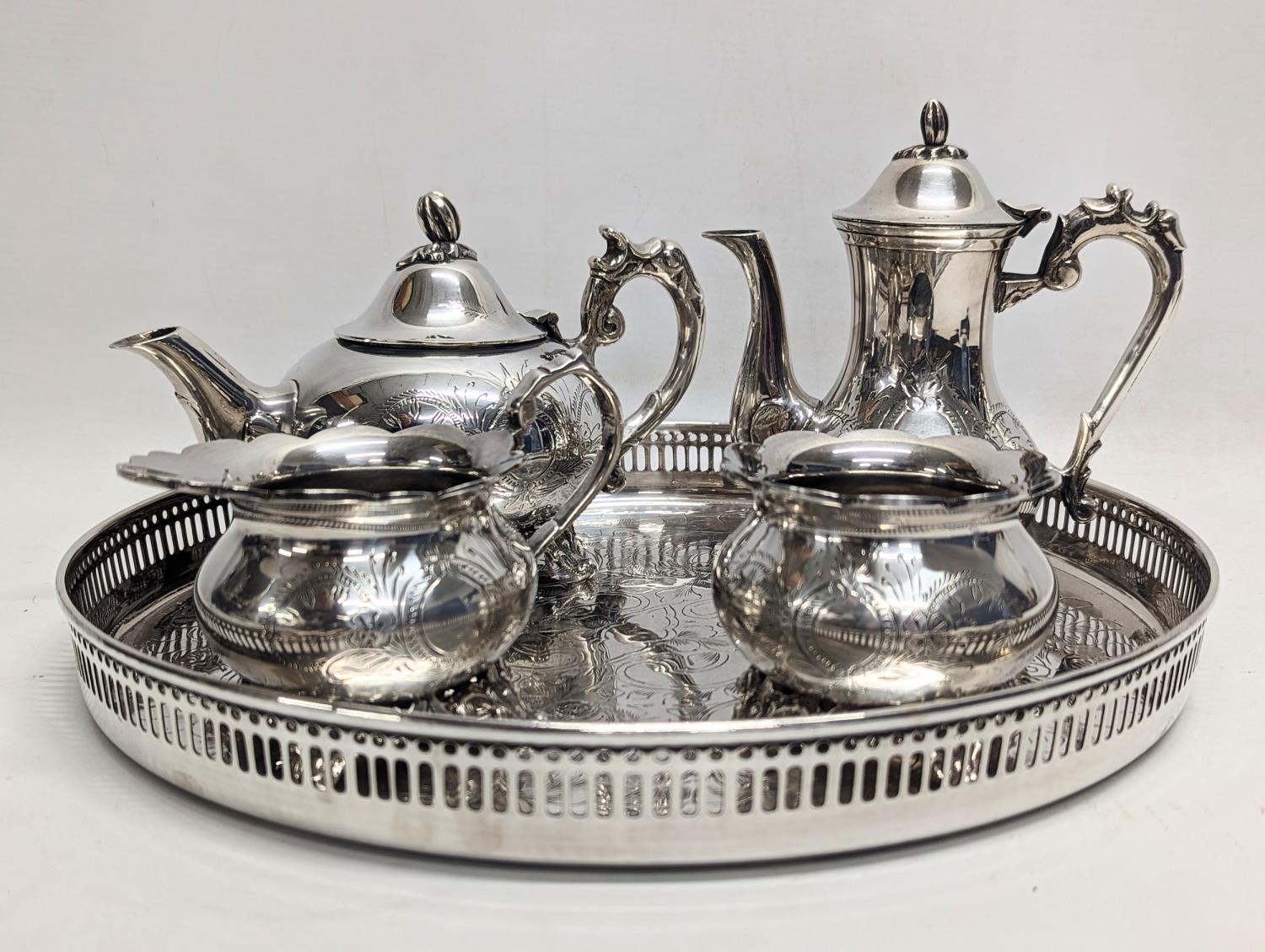 A 5 piece silver plated tea service. Tray measures 33.5cm