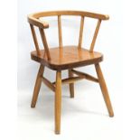 A vintage beech child's chair. 34x33.5x50.5cm