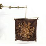 A Victorian ornate brass and tapestry wall hanging. 65x82cm