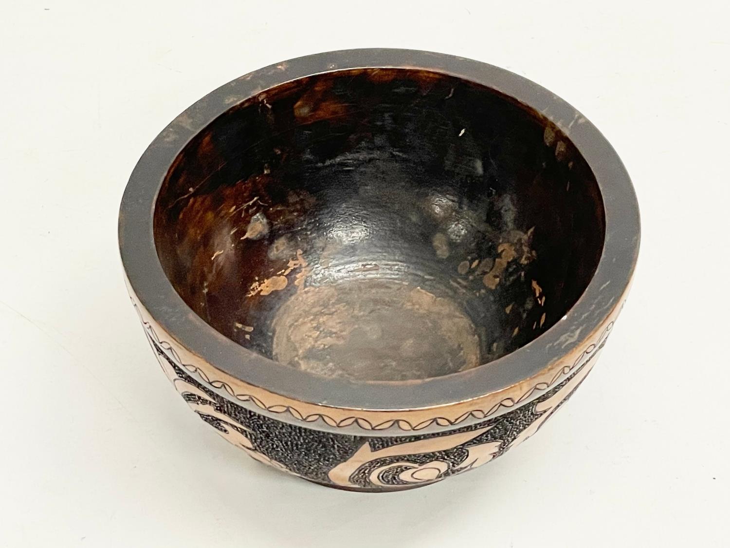 An early 20th century wooden Pokerwork bowl on brass feet. 19.5x11cm - Image 3 of 4