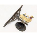 A vintage ornate cast iron wall mounted bell. 20.5x35cm