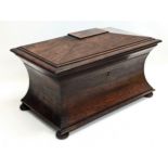 A large Regency rosewood tea caddy in sarcophagus shape, circa 1810. 37x21.5x22.5cm