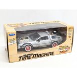 A Back To The Future Delorean Time Machine model toy car by Welly. Box measures 23x10cm