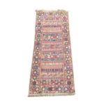 A late 19th/early 20th century hand knotted runner rug. 194x75cm