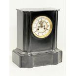 A Victorian slate mantle clock with key and pendulum. 28x17x32.5cm