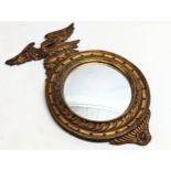 An Edwardian Regency style gilt framed convex mirror. 36.5x58cmn