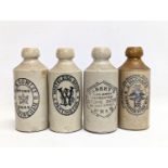 A set of 4 vintage stoneware ginger beer bottles.