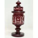 A late 19th century Bohemian Glass urn with lid. 33cm.