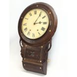 A Victorian brass and Mother of Pearl inlaid wall clock. 44x69cm