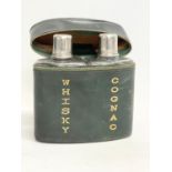 A vintage leather whisky and cognac decanter flask. 13x15cm