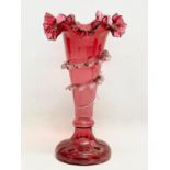 A Victorian ornate Ruby Glass vase. 28cm.