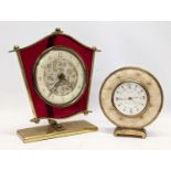 2 vintage brass mantle clocks. Largest measures 20x22cm