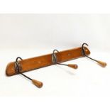 A vintage wall mounted hat and coat rack. 44cm
