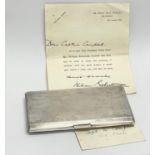 A good quality silver cigarette case presented to Captain W. Campbell 1852-1952, by William