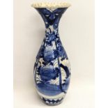 A late 19th century Japanese pottery vase. 31.5cm