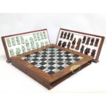 A Japanese style chess set. Complete. Case measures 45.5x22.5x12.5cm