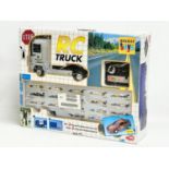 A Renault Toys RC Truck in box. Box measures 52x42x14.5cm