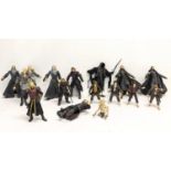 A collection of The Lord of The Rings toy figures by Marvel, including Aragorn, Gandalf, Boromir,