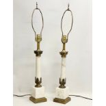 A pair of large onyx and ornate brass lamps with Corinthian style pillars. 83cm