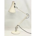 A vintage angle poise lamp.