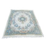 A large vintage hand knotted rug. 367x270cm