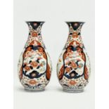 A pair of late 19th century Japanese Imari pattern vases. 19cm