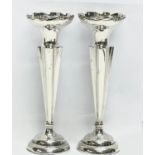 A pair of early 20th century silver Art Nouveau vases. 20.5cm