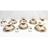 23 pieces of Royal Albert Old Country Roses, teacups and saucers with a pair of salt and pepper