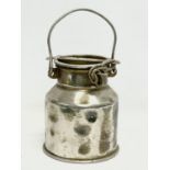 A small vintage milk churn. 29cm including handle.