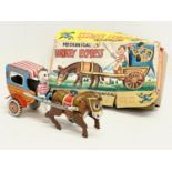 A vintage Japanese tin plate windup ‘Mechanical Donkey Express’ toy in original box. Toy measures