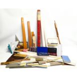 A quantity of vintage architectural equipment, including tracing paper, rulers, etc.