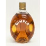 A vintage Haig’s Dimple Whisky. 20.5cm
