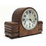 A vintage Art Deco mantle clock with pendulum. 31x22cm