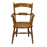 A Victorian kitchen chair with original scumble paint.