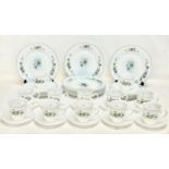 A vintage 48 piece Arcopal Milk Glass tea and dinner set. France. Including 12 dinner plates. 12