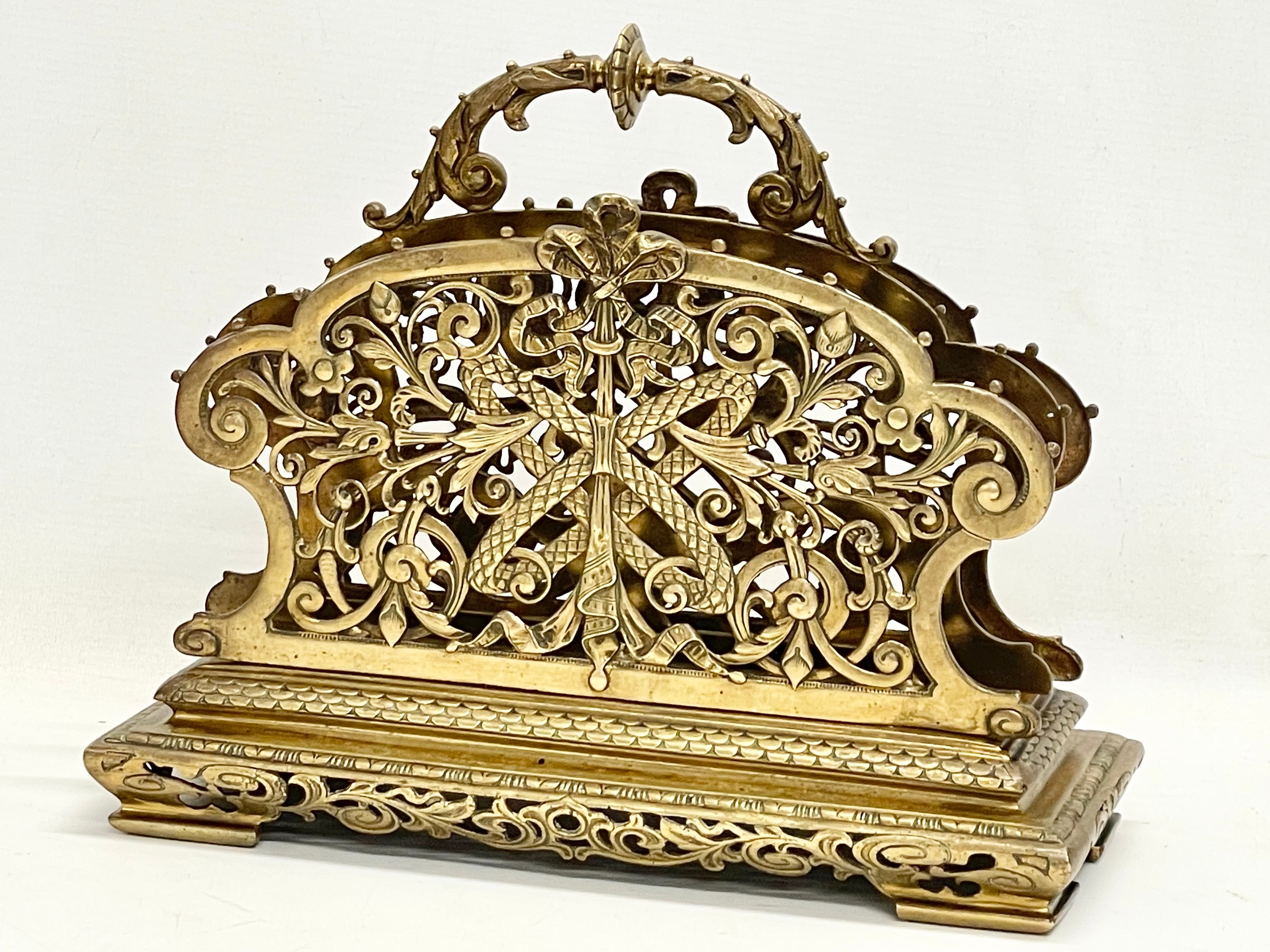 A large Victorian ornate brass desktop stationary letter holder. 31x13x27cm.